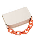 Catena Off-White & Peach two-sided bag with bold orange chain strap, ideal for stylish outings.