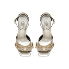 Catena Sahara Platform Ankle Sandal in shimmering gold leather with ankle strap and chain embellishments.
