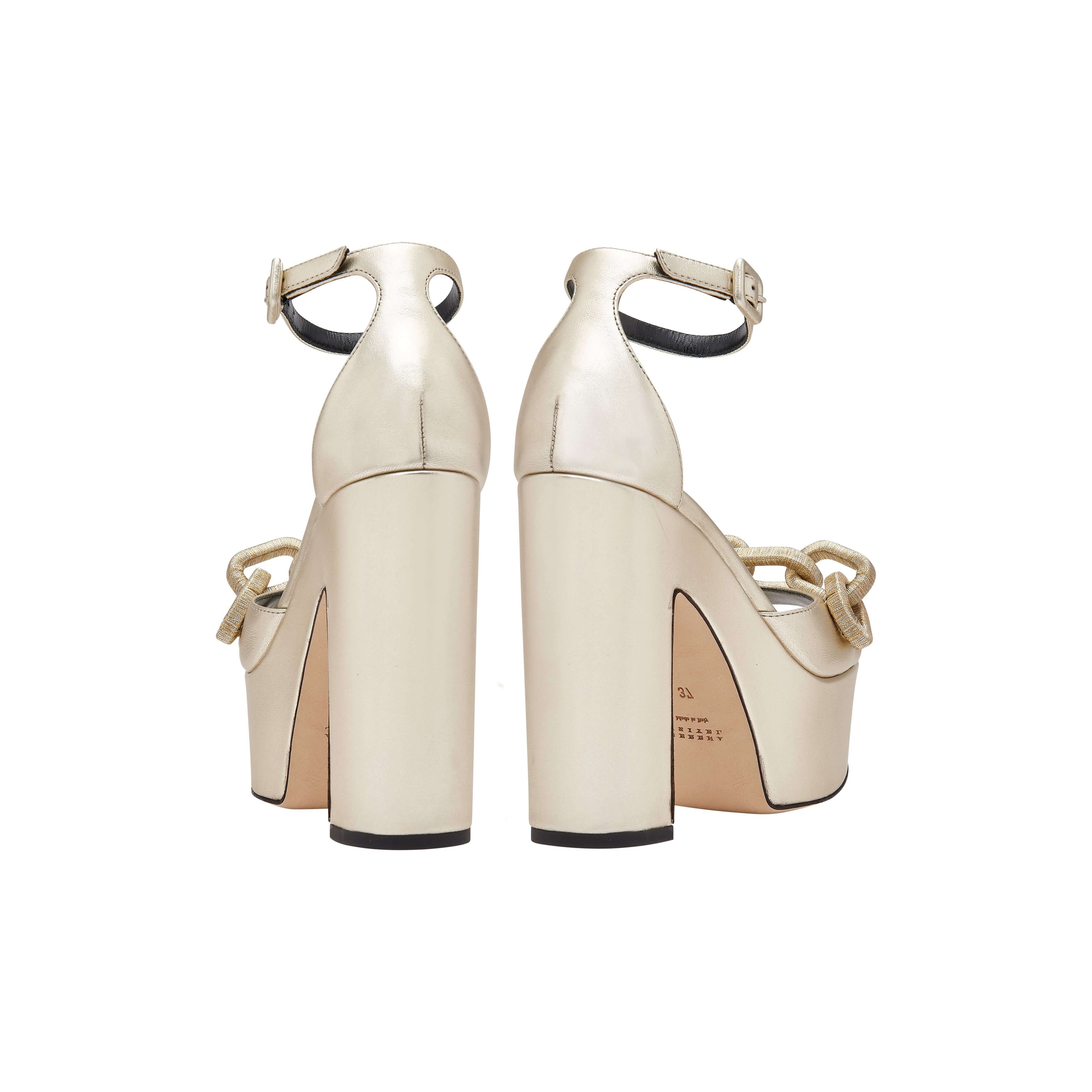 Back view of Catena Sahara Platform Ankle Sandal in shimmering sahara-gold leather with chunky block heels.