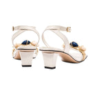 Delphine 50MM Ankle Cross Sandals featuring earthy colors and aqua beads, showcasing a stylish back view with block heel.
