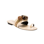 Delphine Nude Flat Toe Sandal featuring earth-toned beads and a comfortable wide strap, perfect for summer styles.
