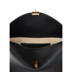 Toteme - T-Lock Leather Clutch Bag - Black