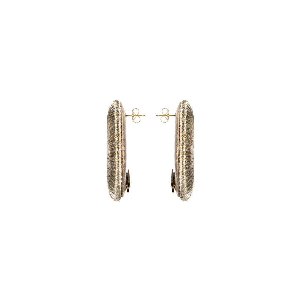 Close-up view of Boho Gold Silver Earring showcasing intricate hand-wrapped metallic threads in circular design.