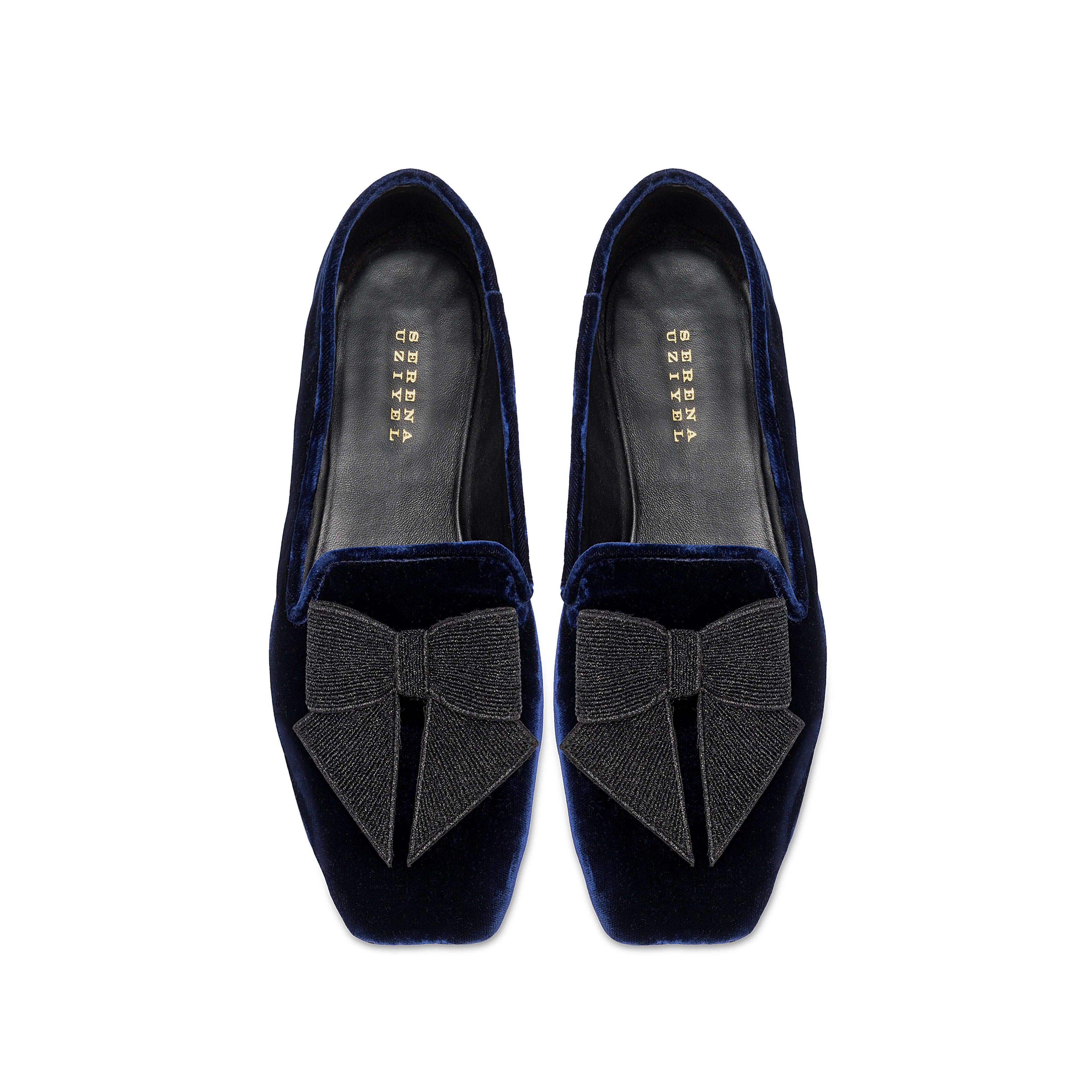 Fiocco Navy Flat Moccasin featuring elegant black embroidered bow on luxurious navy velvet, perfect for chic fall style.