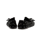 Rear view of Fiocco Studs Flat Moccasin in black suede, adorned with sparkling crystal studs and a studded bow.