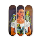 Frida Kahlo's 'Me and My Parrot' artwork reimagined on a triptych skateboard deck set by THE SKATEROOM. Featuring Kahlo’s self-portrait with vibrant parrots, this open edition celebrates her iconic artistry and bold expression.