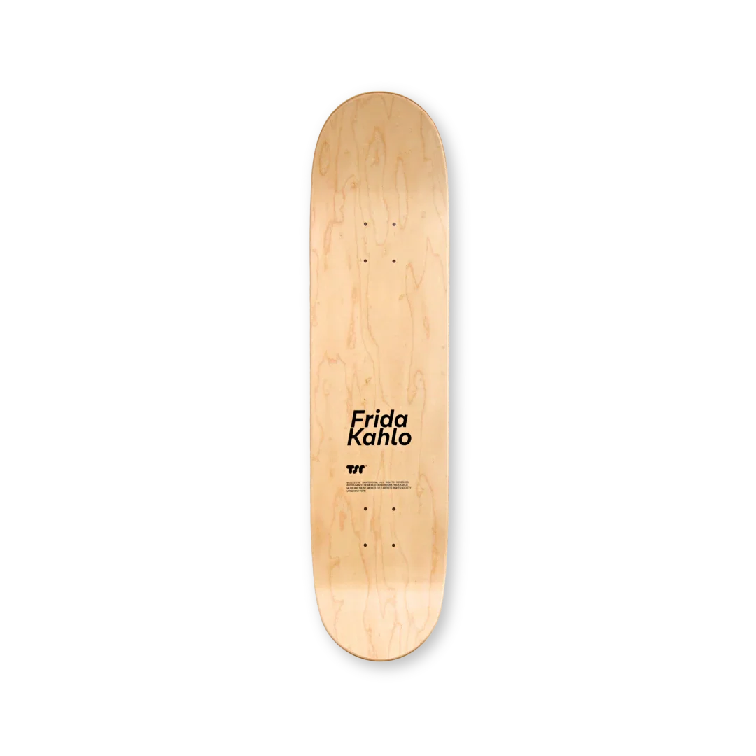 Back view of a Frida Kahlo skateboard deck by THE SKATEROOM, showcasing the artist's name and logo on natural wood grain.