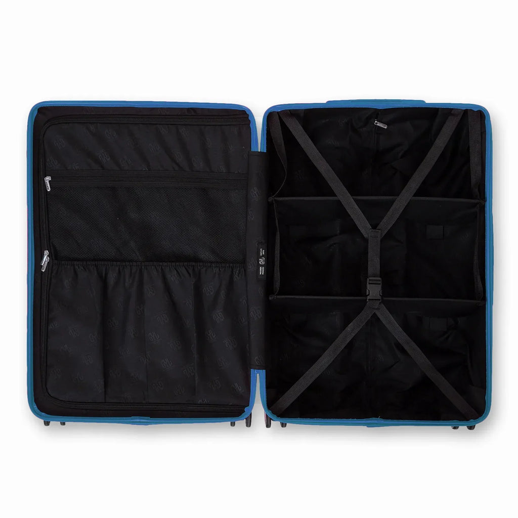 Intérieur compartimenté de la valise GYL Intemporelle bleu grisé avec sangles croisées et poches filet. #couleur_bleu grisé