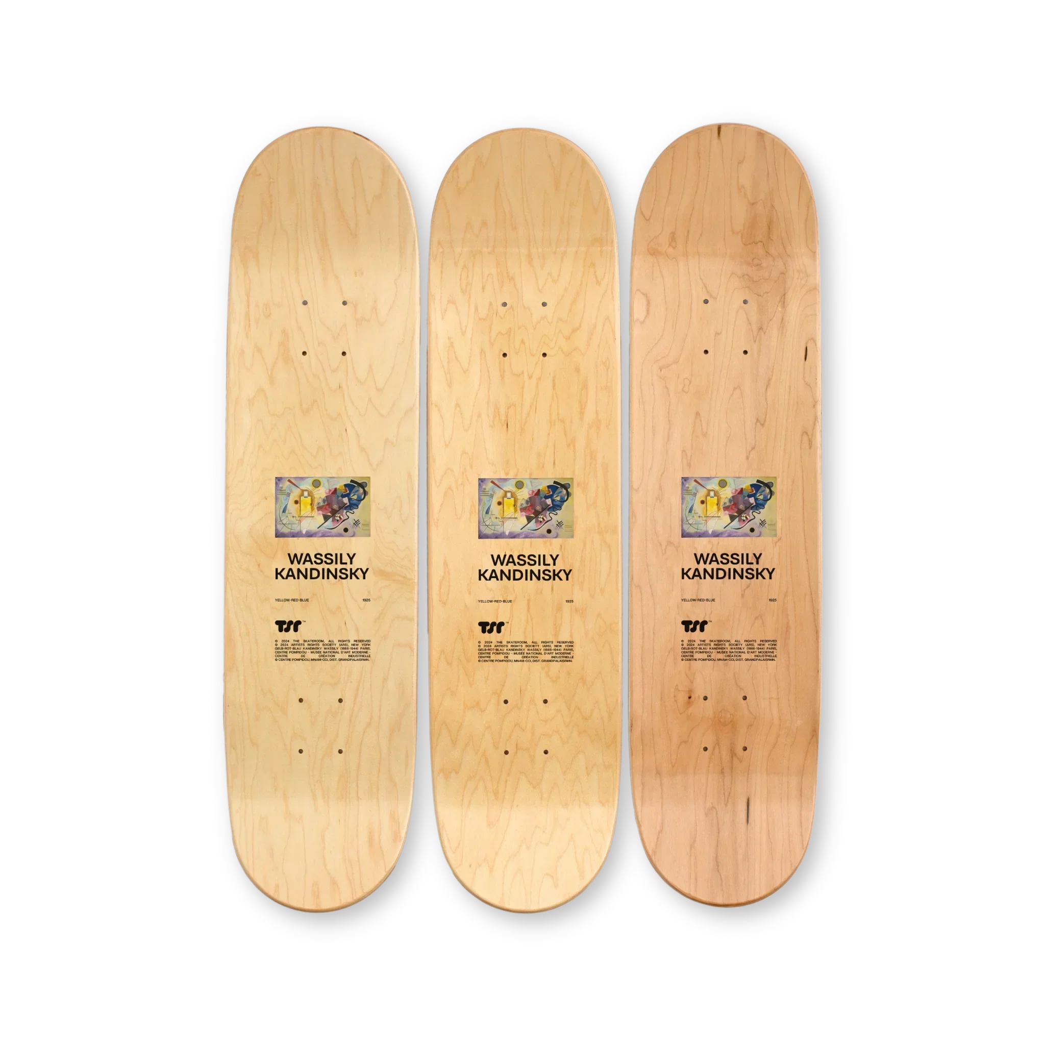 Top print of “Yellow-Red-Blue” triptych skateboard deck set by Wassily Kandinsky – natural wood grain finish with centered artwork reproduction and artist details on each deck, part of THE SKATEROOM x Kandinsky collection benefiting social skate projects.