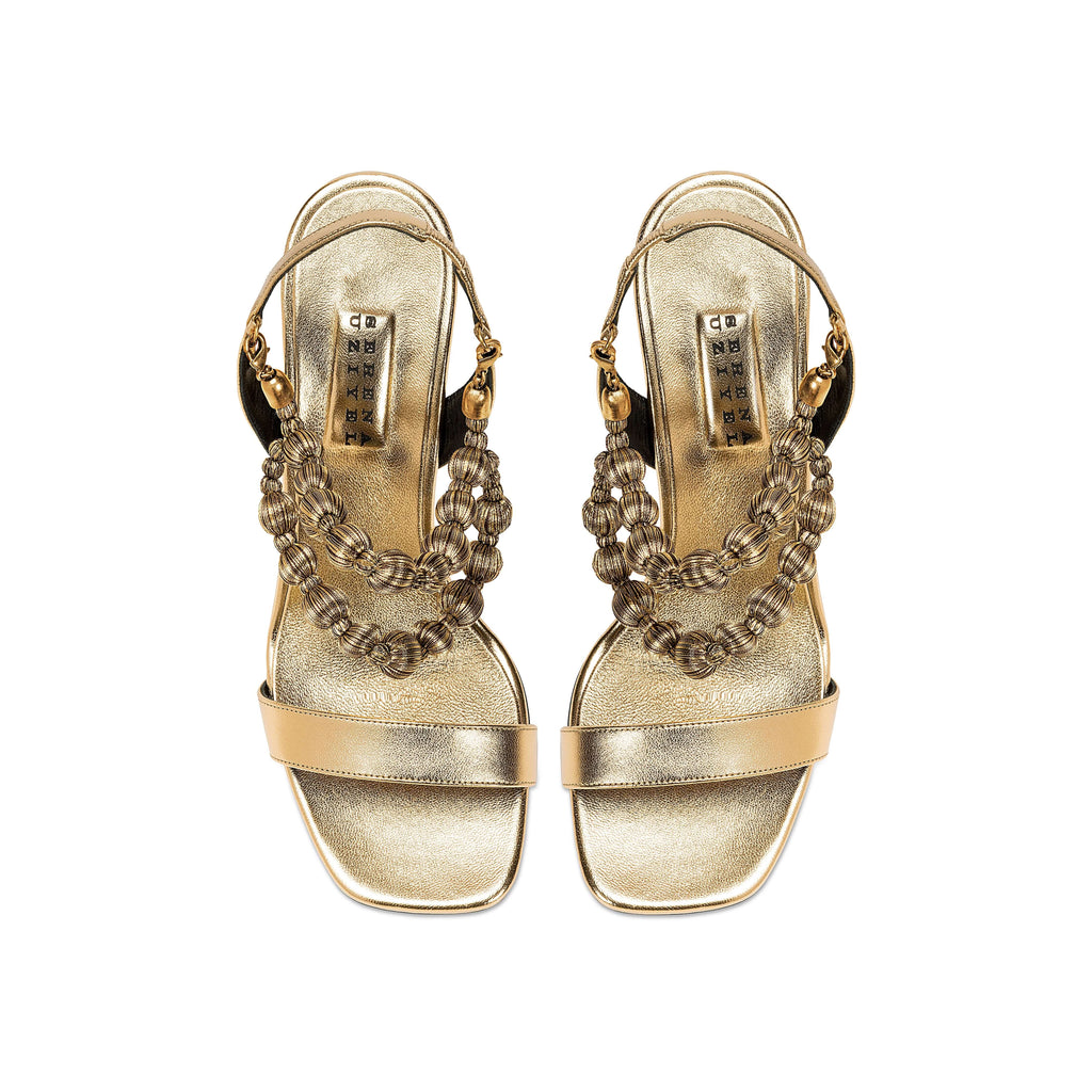 Lyra Gold High-Heel Sandals featuring handwoven embellishments and 90mm stiletto heels, perfect for special occasions.