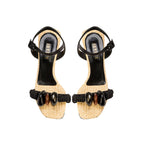 Melita Natural Wedge Ankle Sandal with raffia, stone accents, and black rope straps for stylish summer comfort.