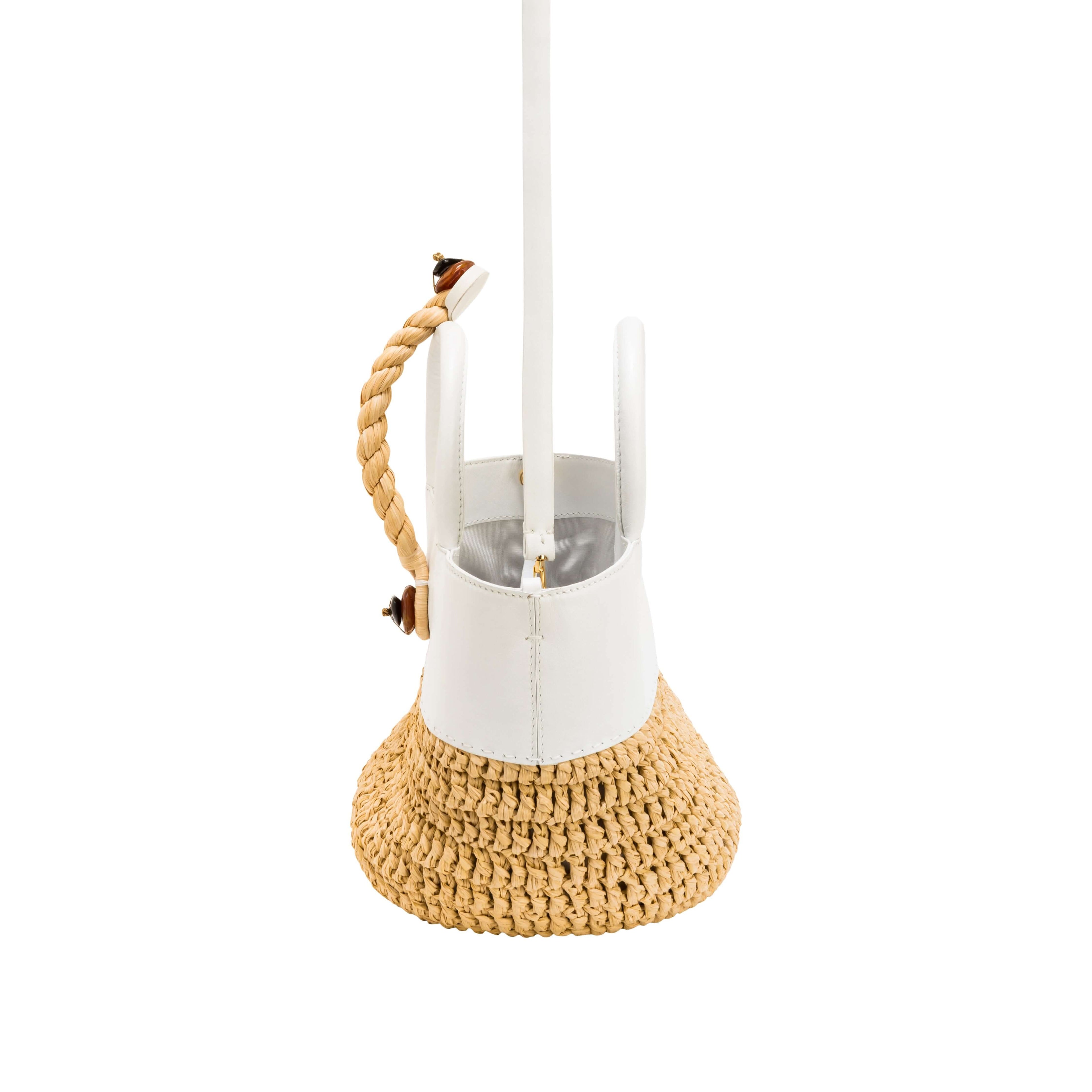 Melita Off-White Mini Tote Bag featuring leather and hand-woven raffia, perfect for summer styling.