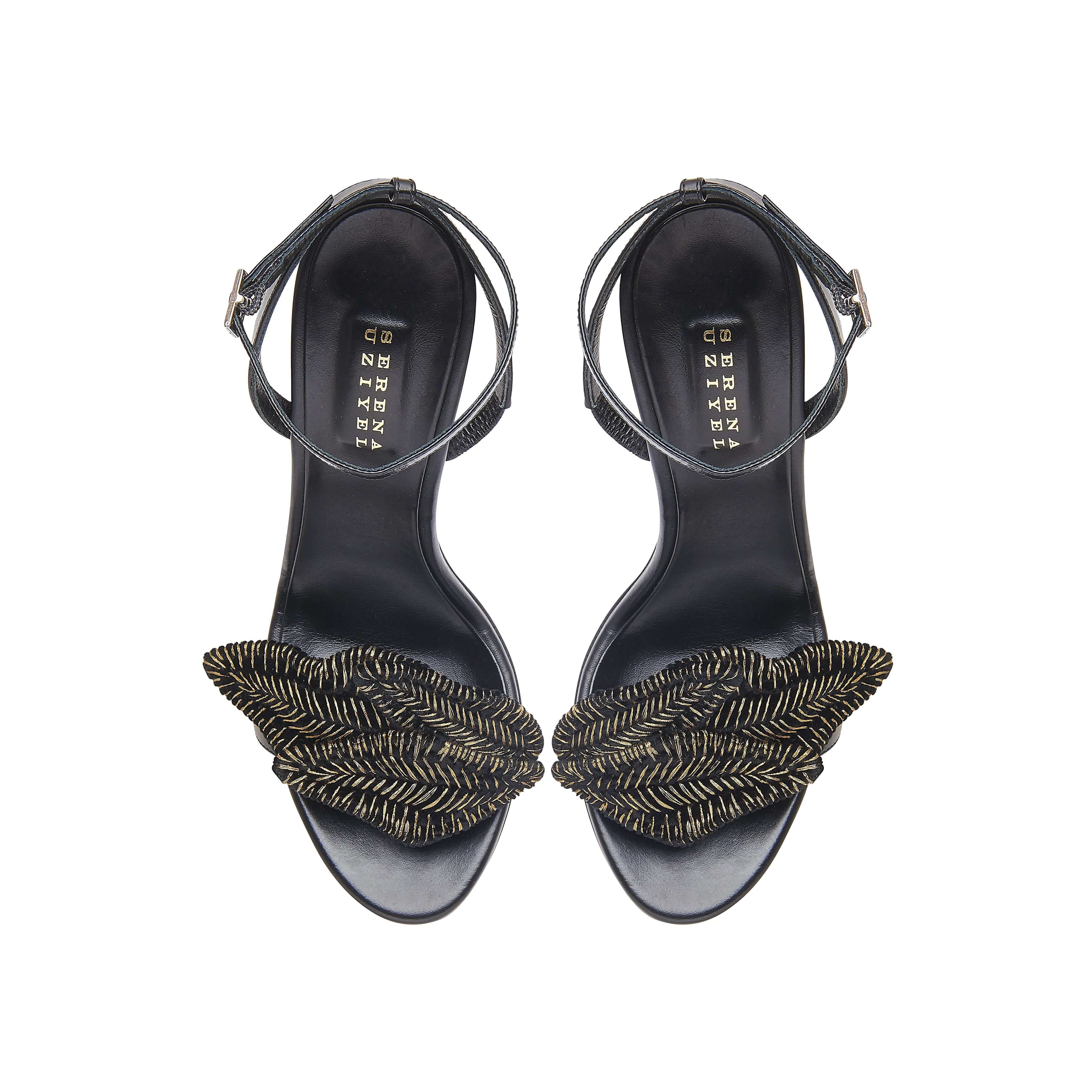 Mirales Black High-Heel Ankle Cross Sandal with stylish leaf detailing and adjustable ankle strap.
