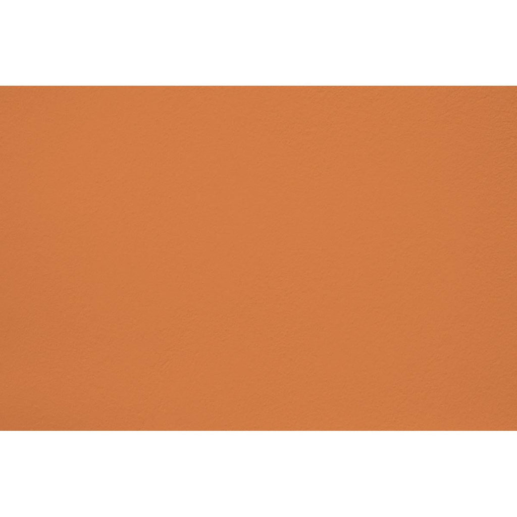 Peinture Menorca break appliquée sur un mur - teinte orange ocre