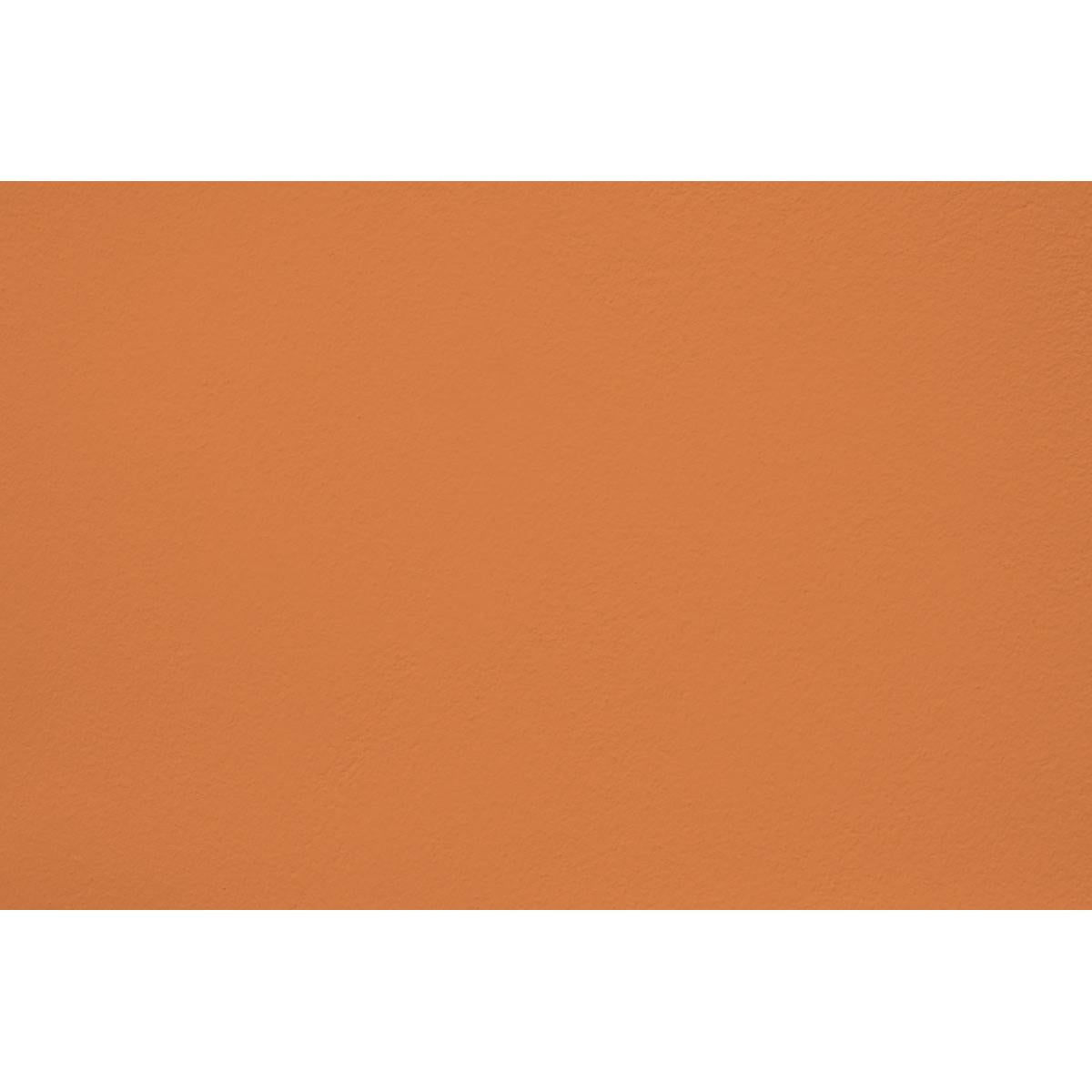 Peinture Menorca break appliquée sur un mur - teinte orange ocre