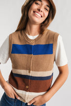 meta-preview, sleeveless cardigan layered over a tee