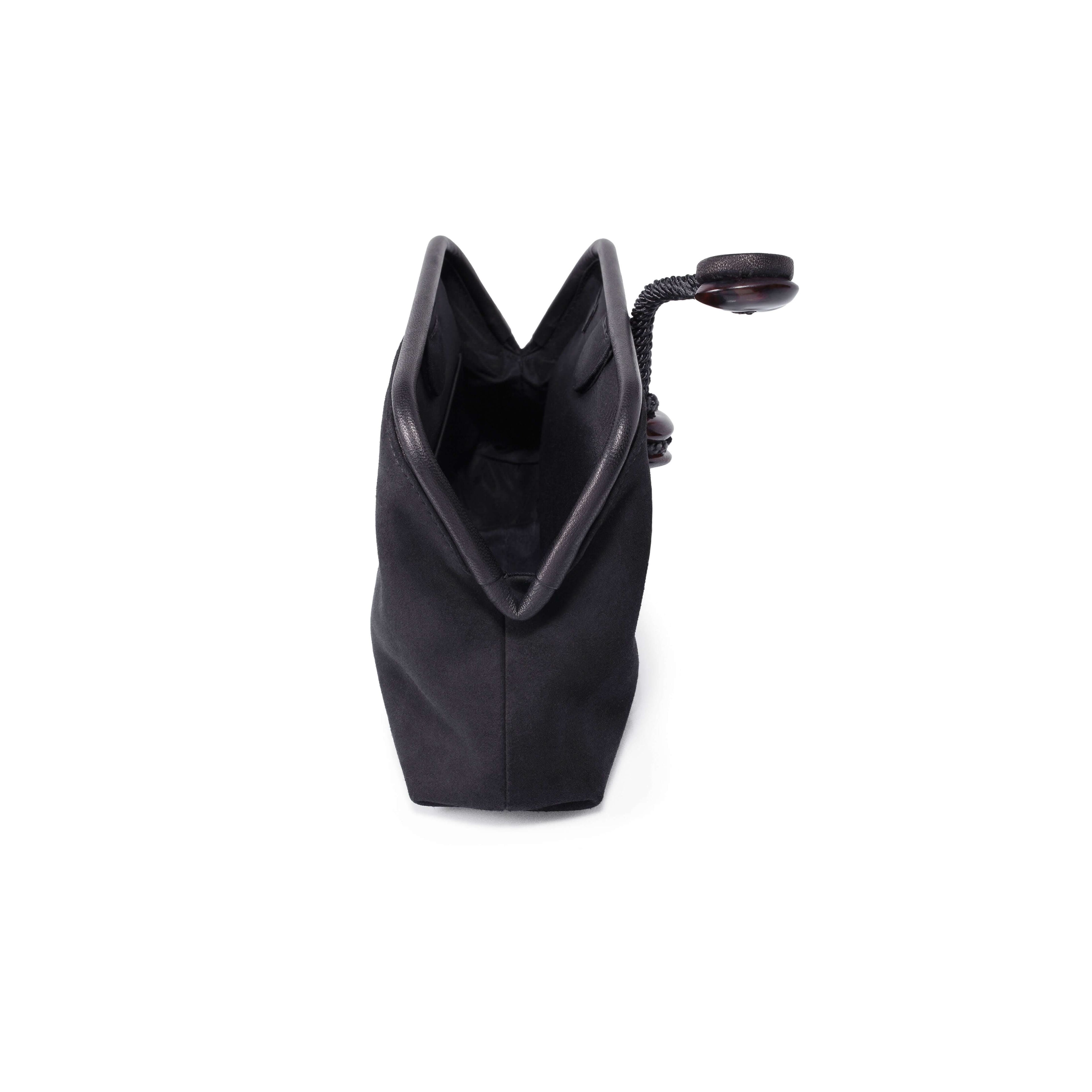 Petra Black Pouch Bag in suede leather with stone embroidery, showcasing its elegant open design.