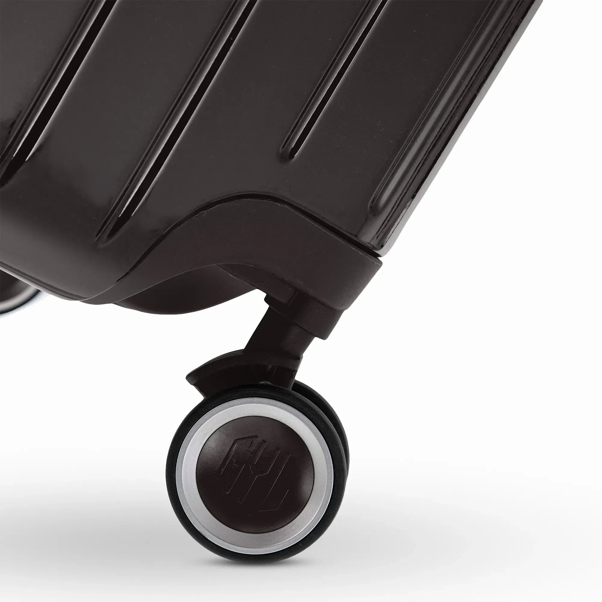 Roue double 360° de la valise GYL Intemporelle noir avec gravure du logo GYL sur le moyeu. #couleur_noir