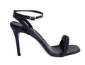 Rovena black high-heel removable ankle sandal in leather, featuring a stylish design with buckle closure and a chic ruffled strap.