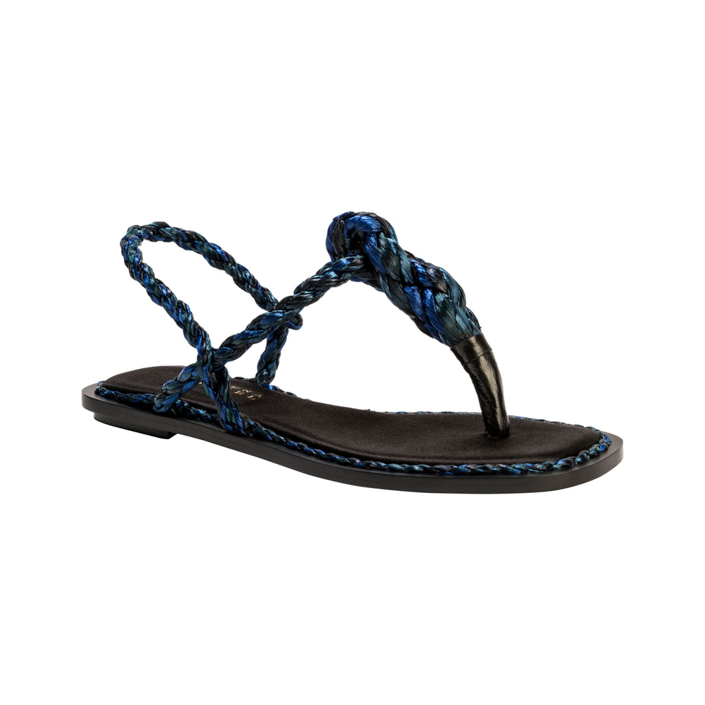 Elegant Thory Navy Flat Sandal with braided navy raffia straps, crafted from silk satin for a refined casual look.
