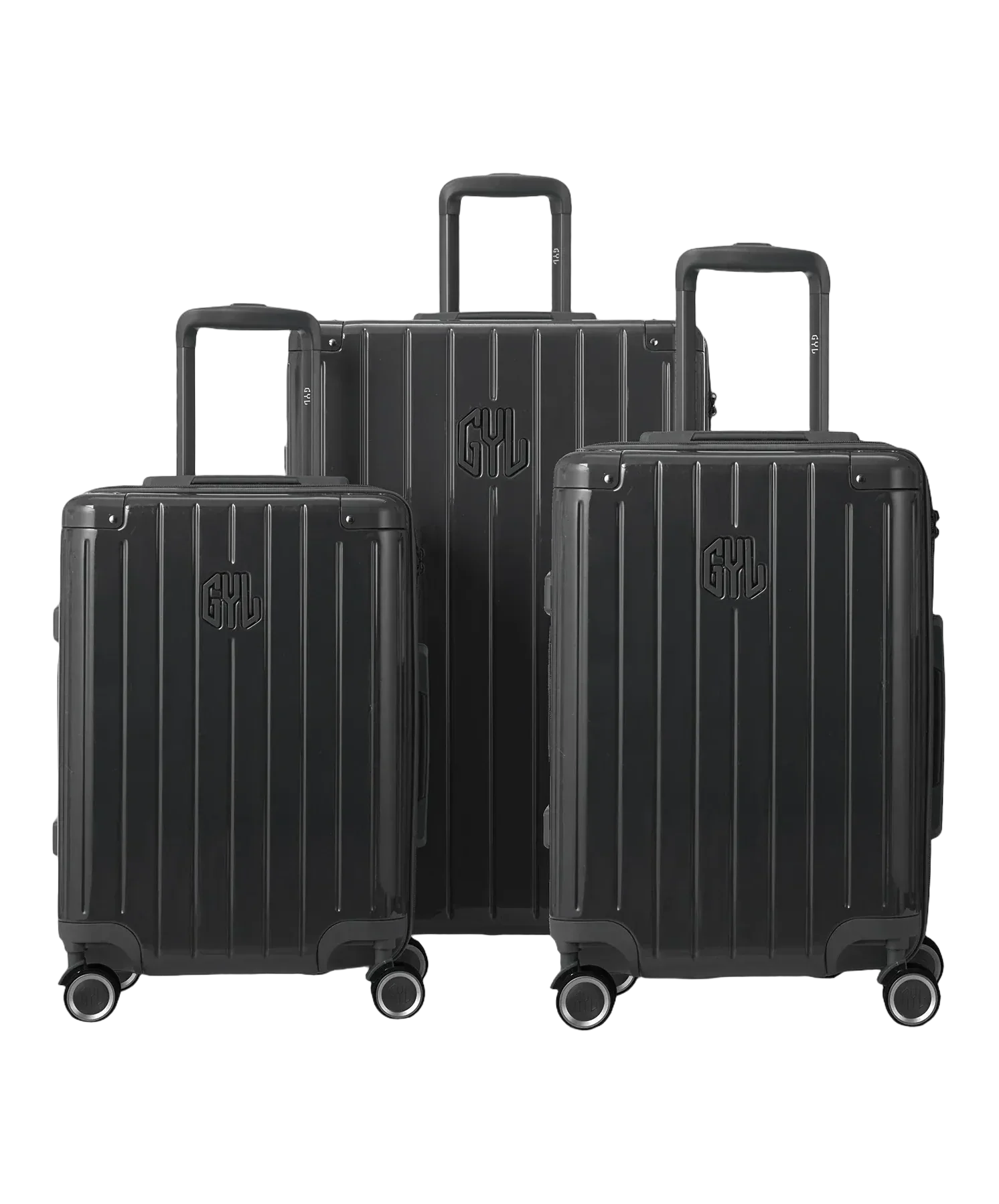 Set de 3 valises Intemporelle en polycarbonate cabine, semaine et soute coloris gris foncé glossy vue de face avec logo GYL, packshot GYL